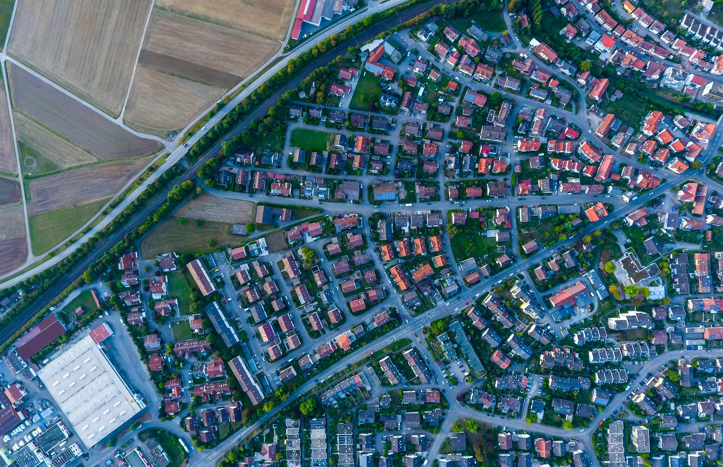 Aerial view of a residential town with houses and streets